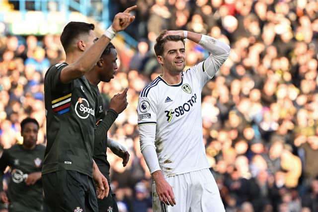 SWAMPED: Leeds United striker Patrick Bamford by Chelsea threats at Stamford Bridge. Photo by OLI SCARFF/AFP via Getty Images.