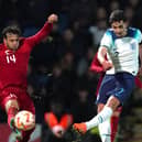 England's Sonny Perkins (right) attempts a shot which is blocked by Turkey's Ali Sahin Yilmaz during the UEFA U19 European Championship Elite Qualifying match at the Technique Stadium, Chesterfield. (Pic: PA)