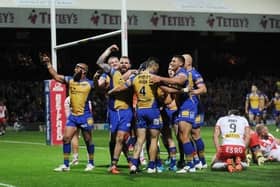 Adam Cuthbertson, third from left, celebrates scoring during Leeds Rhinos' win against St Helens in August, 2017. Saints are unbeaten at Headingley since then. Picture by Steve Riding.