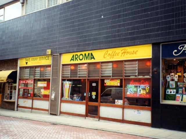 Aroma Coffee House on King Charles Street in August 1991. To the left is Bianco Hair World and on the right Austicks' Bookshop.