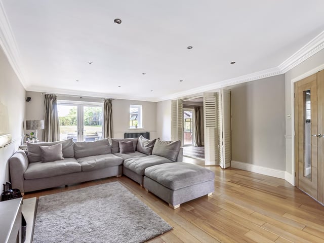 The home’s internal layout offers an exceptional balance of well-planned and nicely flowing reception space, including a large family living room.