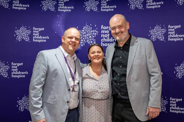 Gareth Pierce, Forget Me Not CEO, left, with Race Across West Yorkshire organisers Michelle Heaney Firth (Forget Me Not) and Clive Mattimoe (RRG Toyota)