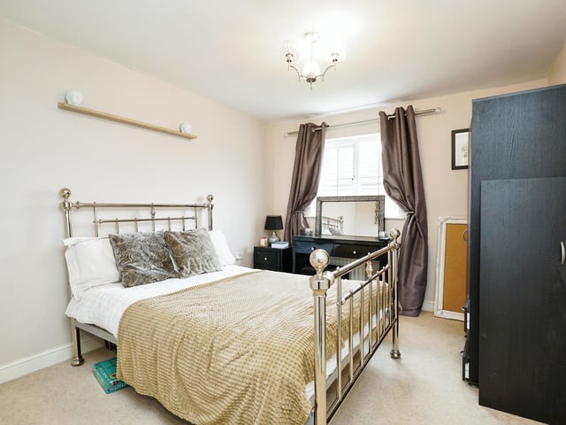 The master bedroom suite has an en-suite dressing room and luxury en-suite shower room.