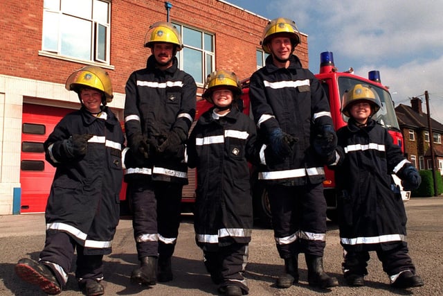 Best boot forward. Three pupils of Richmond Hill Primary School spent a morning with firefighters in April 1997. It was part of a prize in a fire safety competition organised by White Watch from Gipton Fire Station. Pictured in protective clothing, from left, are Terry Cavanagh, firefighter Mick Wilkinson, Stacey Thistlewood, firefighter Stuart Wilson and Vikki Lea.
