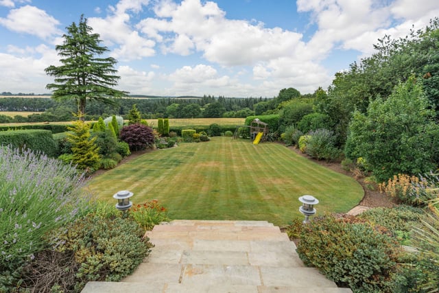 To the rear of the property are extensive, private grounds mainly laid to lawn looking over Eccup Reservoir and beyond, with a generous patio area and a beautiful pond with an abundance of wildlife.