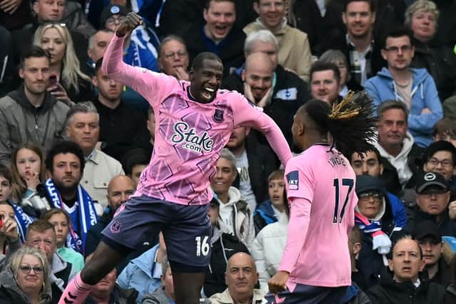 TOFFEES SHOCK: Abdoulaye Doucoure, left, celebrates with Alex Iwobi, right, after putting Everton 2-0 up at Brighton. Photo by GLYN KIRK/AFP via Getty Images.