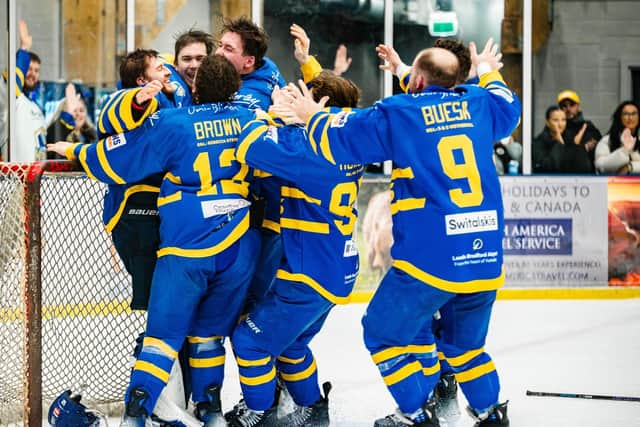 OVER THE LINE: Leeds Knights players celebrate winning a third straight NIHL National league title after defeating Solway Sharks 4-2 at Elland Road on Sunday night. Picture: Knights Media.