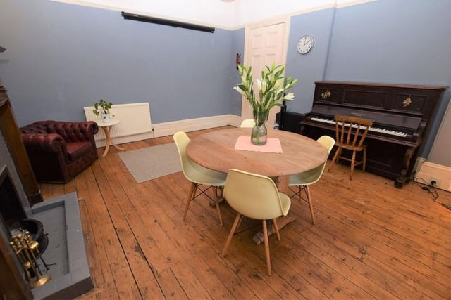 There is a second reception room with feature fireplace and window to the rear.ooplawhich is currently used as a dining room but could also be utilised as a sitting or play room