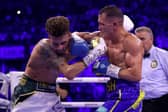 SHEFFIELD, ENGLAND - OCTOBER 07: Leigh Wood exchanges punches with Josh Warrington during the WBA World Featherweight Title fight between Leigh Wood and Josh Warrington at Utilita Arena Sheffield on October 07, 2023 in Sheffield, England. (Photo by James Chance/Getty Images)