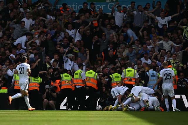 Leeds United celebrate opening the scoring at Elland Road vs Chelsea (Photo by Paul ELLIS / AFP)