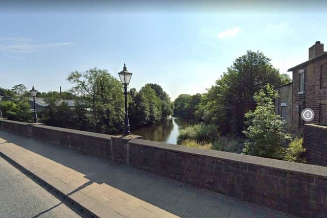 A body has been found on a canal footpath just off Bridge Road.