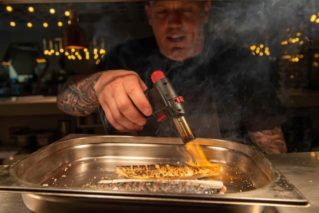 Lee Heptinstall at work in the kitchen. Picture: Bruce Rollinson