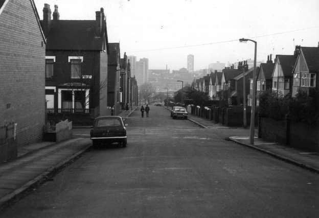 Chapeltown's Mexborough Place, looking south towards the city centre, visible in the distance. On the left is the junction with Mexborough Street, and further streets of terraced houses can be seen leading off to the left. These are Mexborough Drive, Savile Place, Savile Road, and Savile Drive.