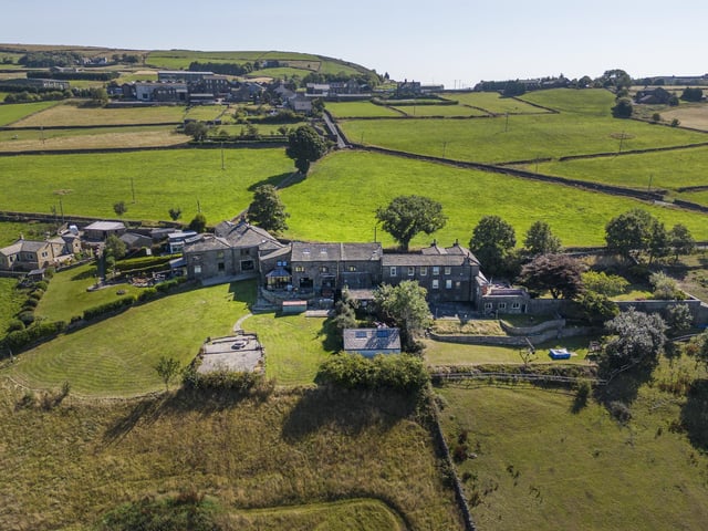 With 2.3 acres of land, Wainstalls House is for sale priced £895,000.