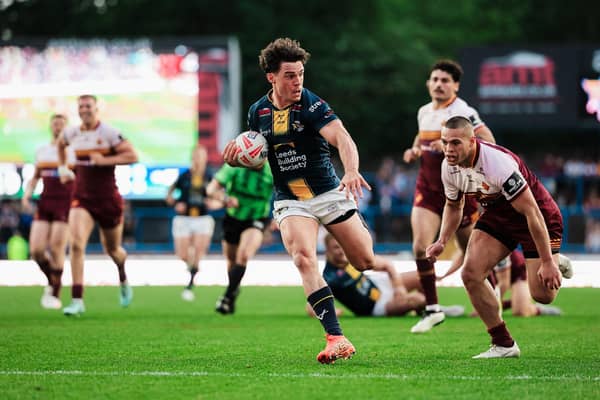Brodie Croft runs in to score for Leeds Rhinos at Huddersfield Giants. Picture by Alex Whitehead/SWpix.com.