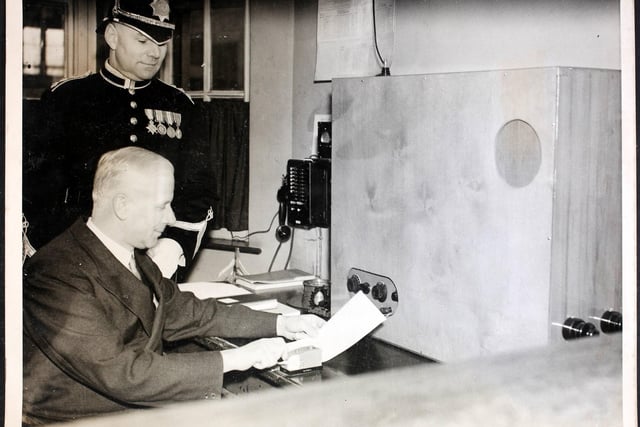 Colonel Brook, Government Inspector of Constabulary, sending out the first message from the new police wireless station at the Police Headquarters in Chesterfield.. Colonel Brook opened the station, the first of many sub-stations, to be linked up with Nottingham, where the head wireless station is established.