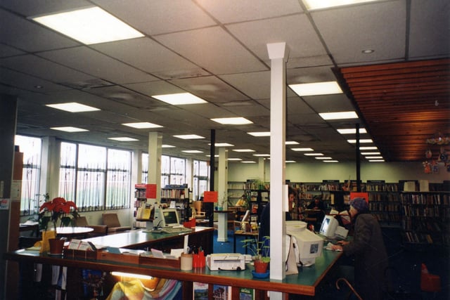 Inside  Beeston Branch Library located in the grounds of Hugh Gaitskill School on St. Anthony's Drive. The library was built in the early 1970's. This view shows the counter area, and the presence of computers for issuing and discharging books after a major refurbishment of the library in 1997.
