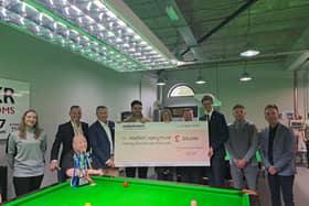 The cheque was presented at the Stephen Harrison Academy in Sheffield