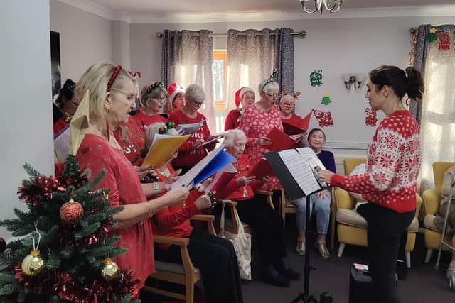 Carol singers at HC-One’s Snapethorpe Hall Care Home’s Christmas Community Café event