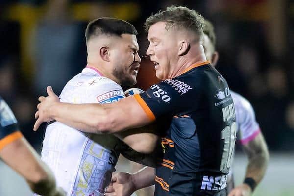 Rhinos' James Bentley is tackled by Adam Milner during last week's derby loss at Castleford. Picture by Allan McKenzie/SWpix.com.