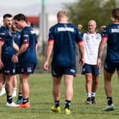 Leeds Rhinos coach Brad Arthur, in white, talks to his players during Wednesday's training session in Las Vegas. Picture by Alex Whitehead/SWpix.com.