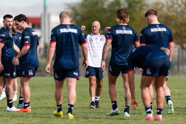 Leeds Rhinos coach Brad Arthur, in white, talks to his players during Wednesday's training session in Las Vegas. Picture by Alex Whitehead/SWpix.com.