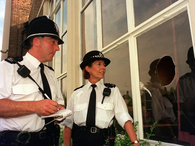 Special Constables Mick Rhodes and Kathy Carter on anti vandal patrol at Alwoodley Primary School in July 1996.