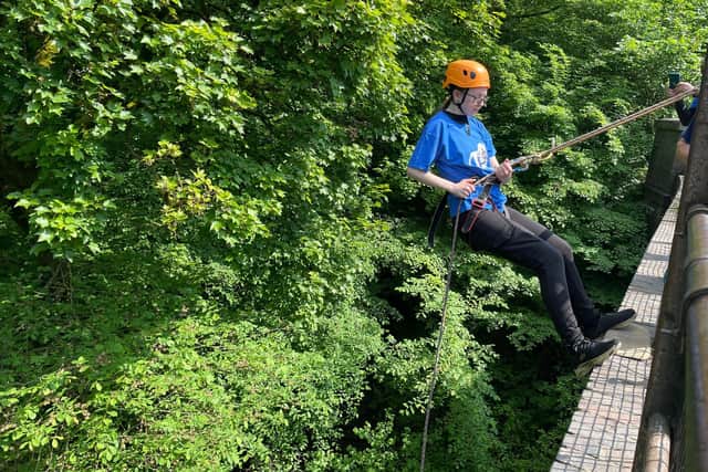 Taking the plunge during last year's Support Dogs' abseil