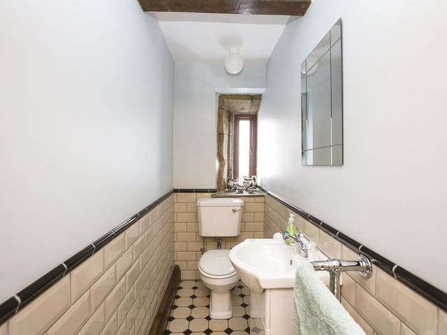 A ground floor w.c. and a fitted utility room add to the facilities.