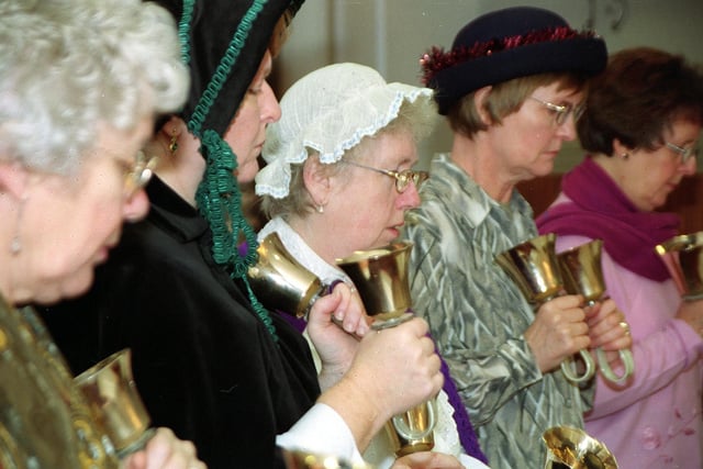 Otley Chevin Bell Ringers entertain listeners at the Otley Victorian Fayre in December 2002.