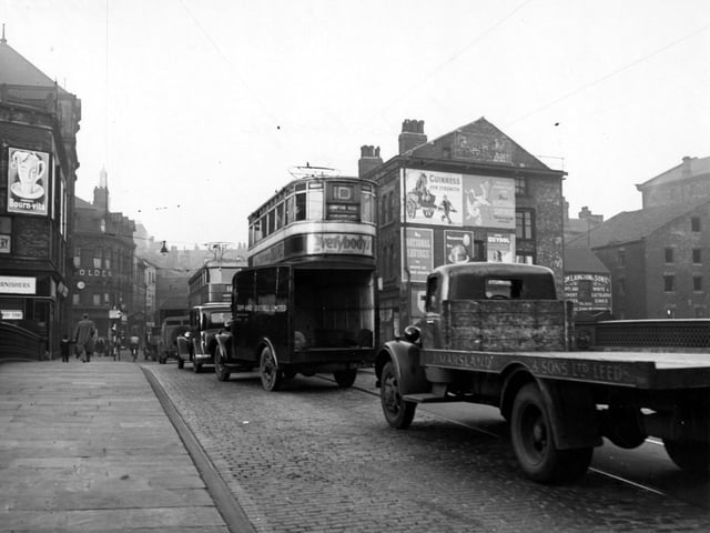 A number 10 tram to Compton Road is visible in this view looking north onto Briggate in November 1949.