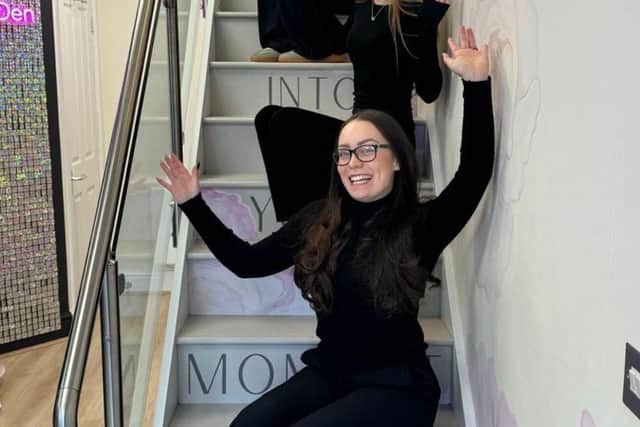 Lia Brehmer at the bottom of the stairs with the rest of the team at the Prom Den in Horsforth