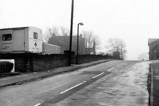 Looking south along Street Lane. On the left, a van belonging to the 4th Morley/Gildersome Scout Group is parked. Beyond that are Gildersome Liberal Club and St. Peter's Vicarage. Pictured in February 1980.
