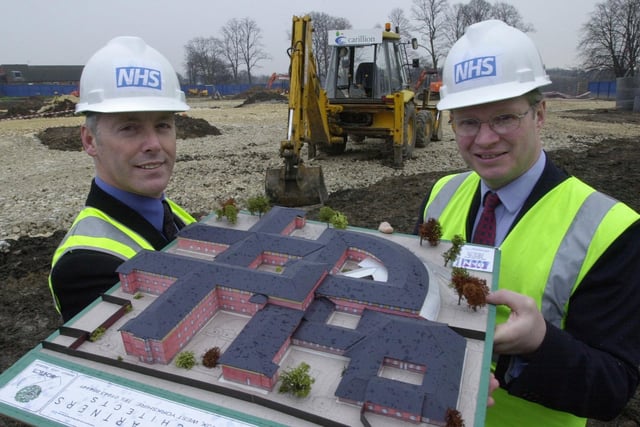 Mike Atkin, left, Chief Executive of Leeds Community and Mental Health Services Teaching NHS Trust and  Nigel Crisp, NHS chief Executive and Permanent Secretary for the Department of Health,  with a model of the new mental health services unit at Seacroft Hospital, in 2001.