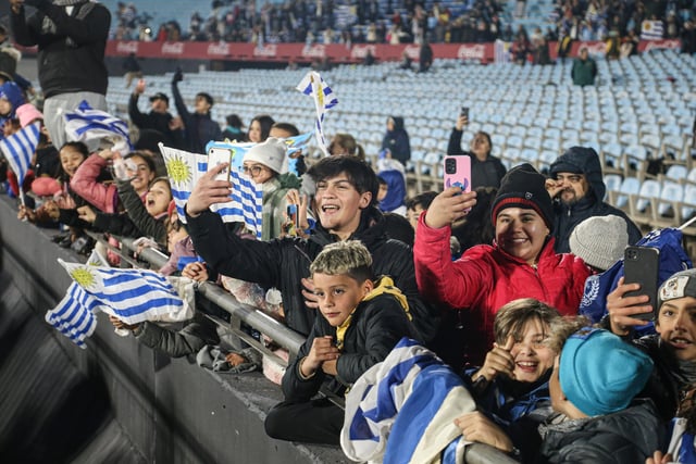 Young fans battle to catch a glimpse of the revered coach (Photo by Ernesto Ryan/Getty Images)