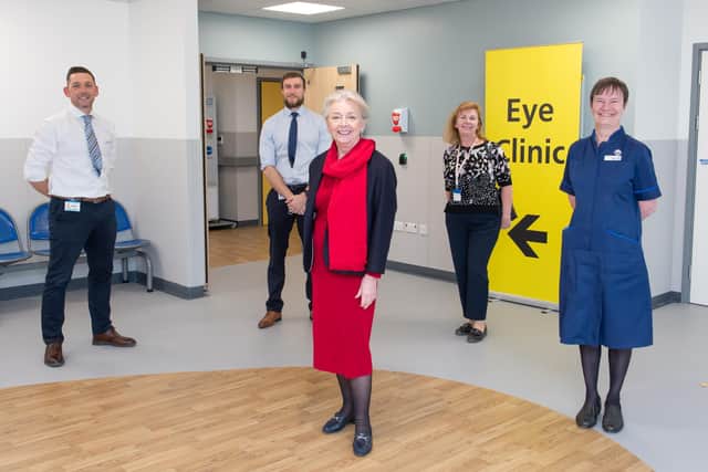 LTHT Chair Dame Linda Pollard with colleagues outside the new eye department at St James's Hospital