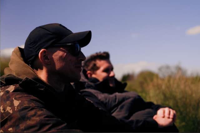 Andy fishing with a friend (Photo: LDR Media)