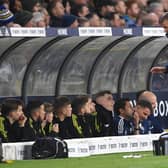 LEEDS, ENGLAND - MARCH 10: Leeds Head coach Jesse Marsch talks with his substitutes on the bench during the Premier League match between Leeds United and Aston Villa at Elland Road on March 10, 2022 in Leeds, England. (Photo by Stu Forster/Getty Images)