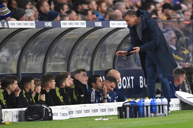 LEEDS, ENGLAND - MARCH 10: Leeds Head coach Jesse Marsch talks with his substitutes on the bench during the Premier League match between Leeds United and Aston Villa at Elland Road on March 10, 2022 in Leeds, England. (Photo by Stu Forster/Getty Images)