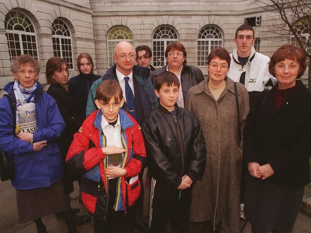Members and supporters of the parents action group outside Leeds Civic Hall in December 1998 where a vote was taken to close the school.