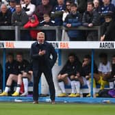 PLAY-OFFS PLACE: For Carlisle United and Leeds United loanee Alfie McCalmont under boss Paul Simpson, centre. Photo by Stu Forster/Getty Images.