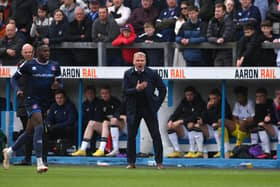 PLAY-OFFS PLACE: For Carlisle United and Leeds United loanee Alfie McCalmont under boss Paul Simpson, centre. Photo by Stu Forster/Getty Images.