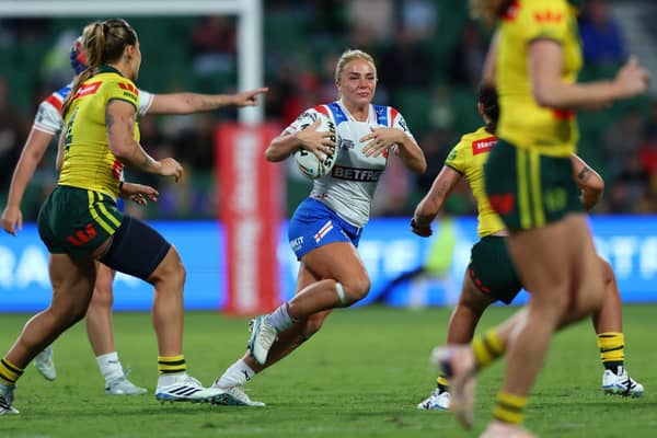 Leeds Rhinos' Lucy Murray on the attack for England against Australia. Picture by Peter Keleman/SWpix.com.