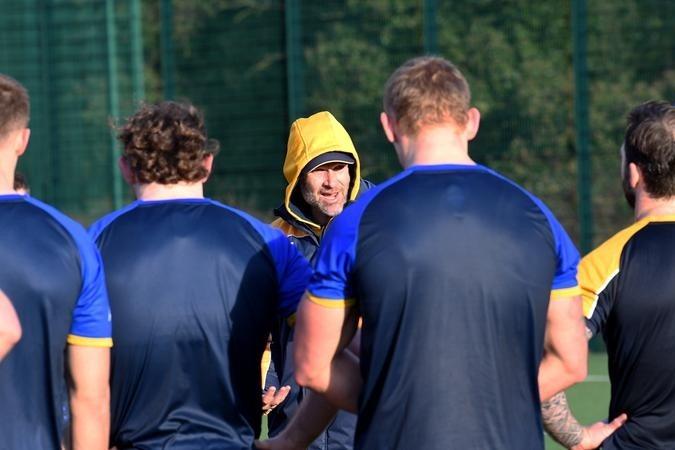 Leeds' coach talks to his players as they return to training after a Christmas/new year break.