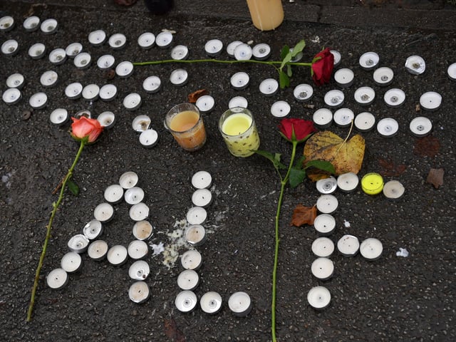 Candles and roses have also been seen near to where the attack was reported on Tuesday (November 7) afternoon.