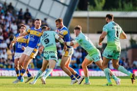 Cooper Jenkins, with ball, could return from injury for Leeds Rhinos at Hull FC today, but Cameron Smith, also on the picture, remains on the casualty list. Picture by Alex Whitehead/SWpix.com.