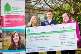 Representatives of SASH receive funds from Chris Carlin of Miller Homes Yorkshire