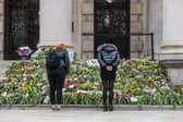 Floral tributes in memory of Her Majesty Queen Elizabeth II on the steps of Leeds Civic Hall (Photo: James Hardisty)