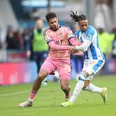 THEORY SLAMMED: By Huddersfield Town's David Kasumu, centre, pictured battling it out with Leeds United's Georginio Rutter in March's Championship clash at the John Smith's Stadium. Photo by Ed Sykes/Getty Images.