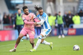 THEORY SLAMMED: By Huddersfield Town's David Kasumu, centre, pictured battling it out with Leeds United's Georginio Rutter in March's Championship clash at the John Smith's Stadium. Photo by Ed Sykes/Getty Images.
